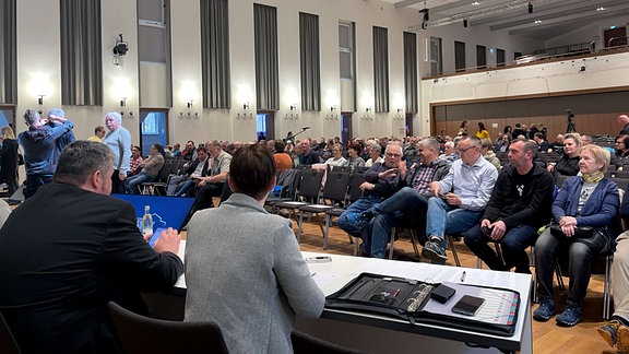 Infoveranstaltung, Besucher auf Sitzplätzen.