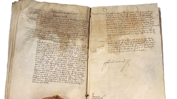 Mit dieser Urkunde wurde 1555 in Augsburg der Religionsfriede zwischen Lutheranern und Katholiken besiegelt.