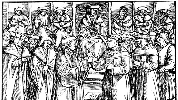 Der Reichstag zu Worms, 1521. Luther in Gegenwart von Kaiser Karl V. Luther rechts, Johann von der Ecken links zwischen ihnen.