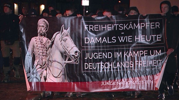 Großes Plakat der Jungen Nationalisten auf Halberstädter Friedensdemo